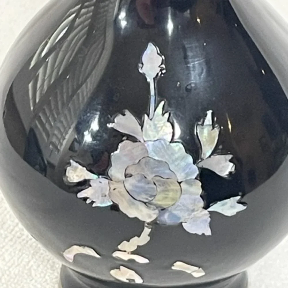 Asian black lacquer, brass and mother of pearl vase